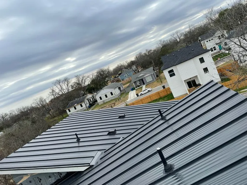 Standing seam metal roof panels with vents for Skylight Repair in Brenham